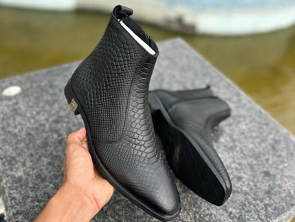 Scaled snakeskin zip-up pointed leather boots