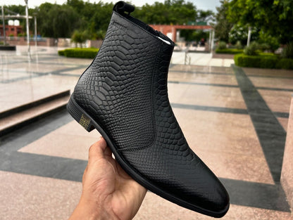 Scaled snakeskin zip-up pointed leather boots